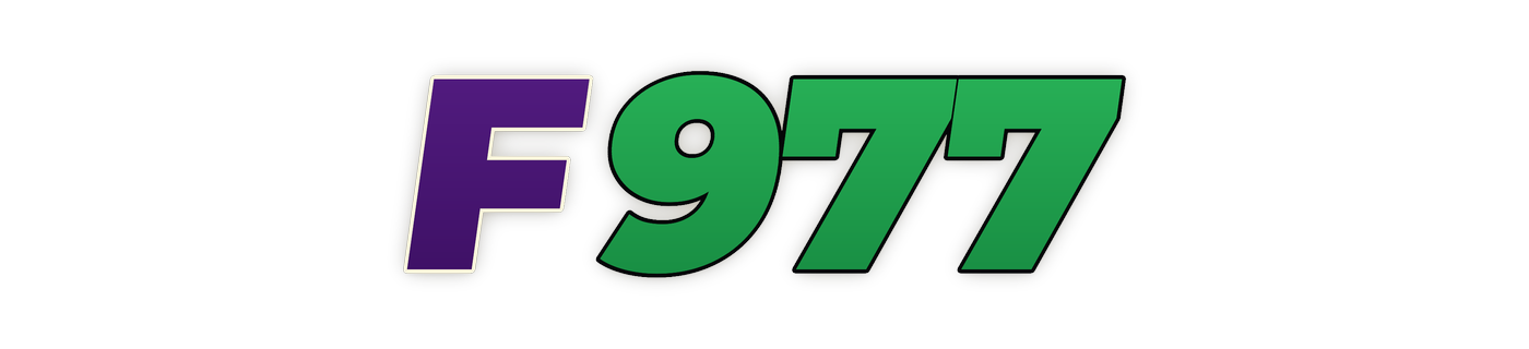 f977